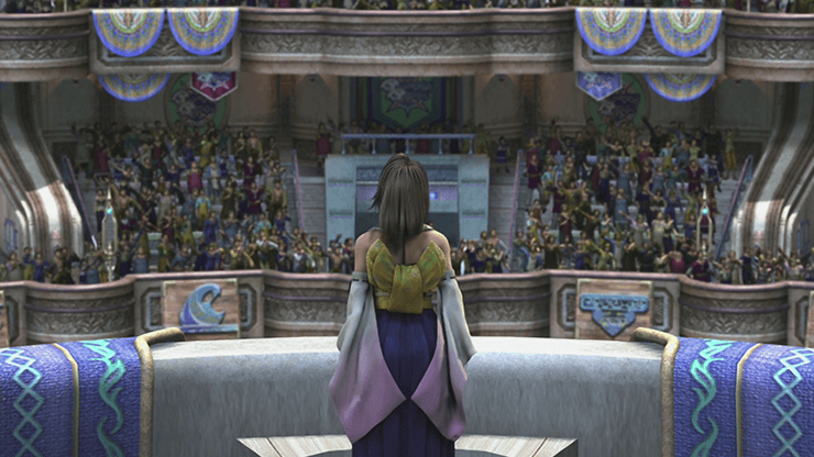 Yuna speaking to the crowd during the final cinematic