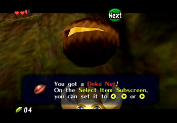 Link holding a Deku Nut
