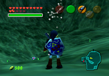 Link at the bottom of Zora’s Fountain staring at a Piece of Heart
