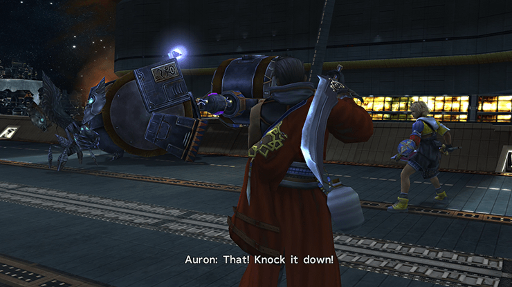 Auron directing Tidus to attack the tanker