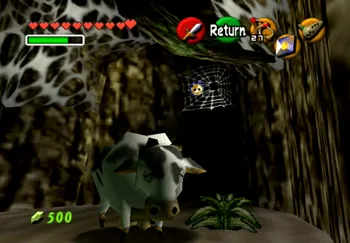 Lon Lon Cow next to a Gold Skulltula