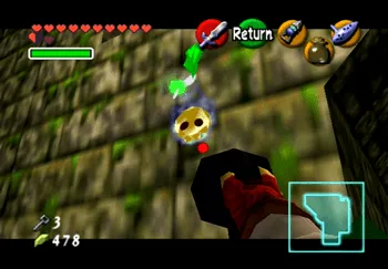 Aiming at the Gold Skulltula on the wall